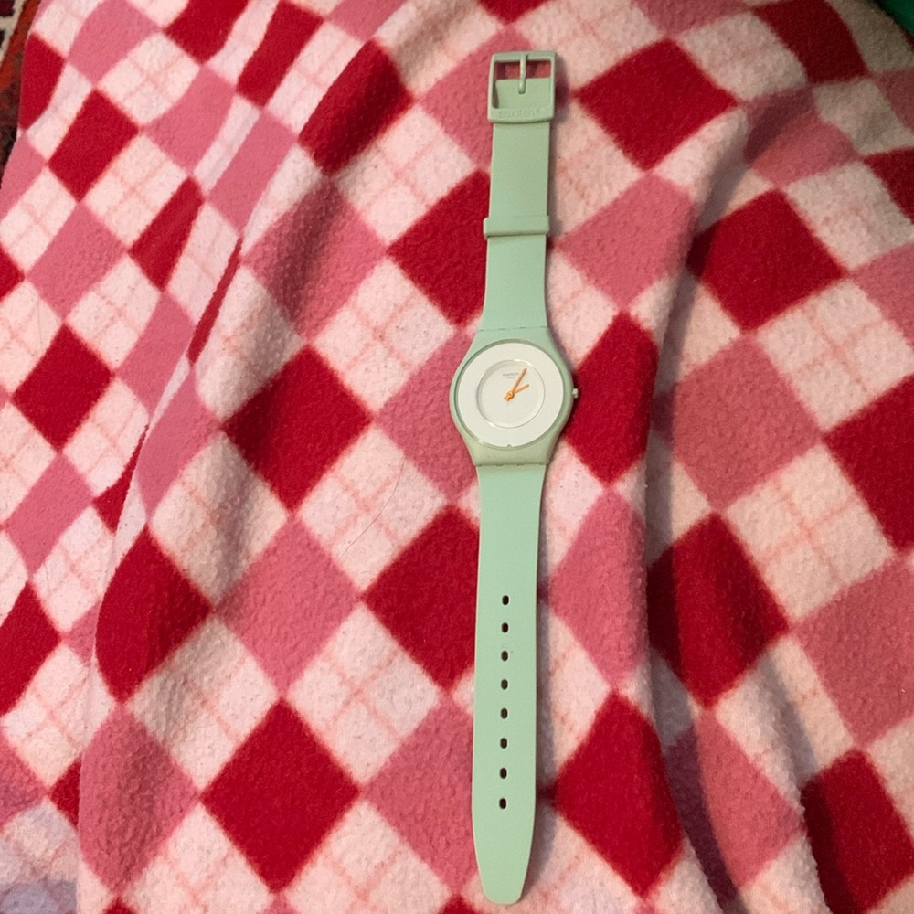 Swatch light green unisex watch